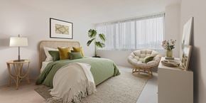 Alexandria apartment for rent - a bedroom with a bed and a chair and a window