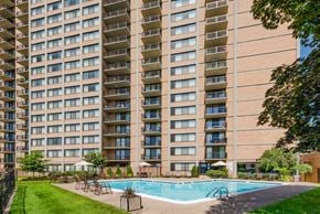 Alexandria apartment for rent - a swimming pool in front of an apartment building
