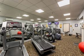 Columbia apartment for rent - a gym with treadmills and other exercise equipment in a building