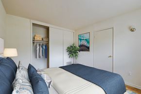Silver Spring apartment for rent - a bedroom with a bed and a closet