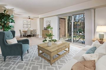 Crofton apartment for rent - a living room with a couch and a coffee table    and a patio
