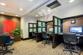 Bethesda apartment for rent - a conference room with desks and chairs and a television