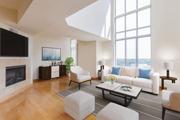 Bethesda apartment for rent - a living room with white furniture and a large window
