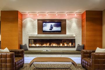 Towson apartment for rent - a living room with couches and a fireplace