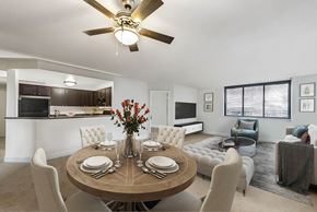 Baltimore apartment for rent - A modern dining room with a round table set for six.