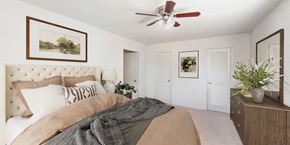 Annandale apartment for rent - a bedroom with a bed and a ceiling fan