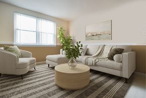 Baltimore apartment for rent - a living room with a couch and a coffee table