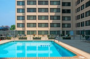 Silver Spring apartment for rent - a swimming pool with a hotel in the background