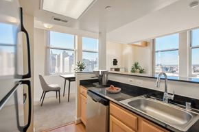 Baltimore apartment for rent - a kitchen with a sink and a large window