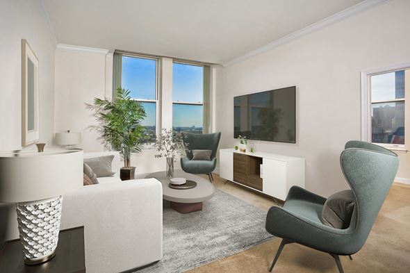 Baltimore apartment for rent - a living room with white furniture and large windows