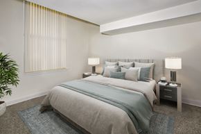 Baltimore apartment for rent - a bedroom with a bed and a window