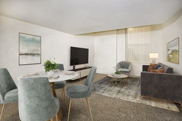 Baltimore apartment for rent - a living room with a table and chairs