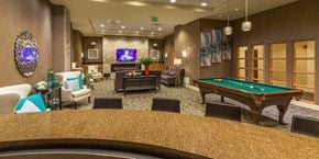 Baltimore apartment for rent - a clubhouse with a pool table and a bar