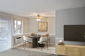 Riverdale apartment for rent - A modern dining room with a glass table and chairs.
