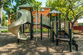 Landover apartment for rent - a playground with a slide and other playground equipment