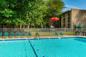 Alexandria apartment for rent - our apartments have a large pool with chairs