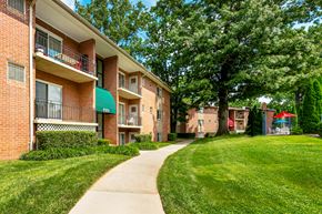 Owings Mills apartment for rent - our apartments have a spacious courtyard with green grass and trees