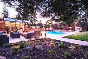 San Jose apartment for rent - a backyard with a swimming pool and patio furniture