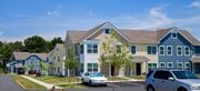 Cecilton apartment for rent - a row of houses with cars parked in front of them