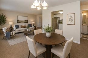 Reisterstown apartment for rent - A dining room with a round table and chairs.