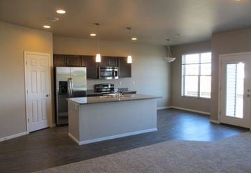 Moorhead townhouse for rent - an empty kitchen with an island in the middle