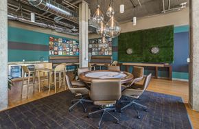 Denver apartment for rent - a dining room with a round table and chairs