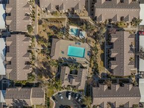 Las Vegas apartment for rent - a birds eye view of a neighborhood with a swimming pool