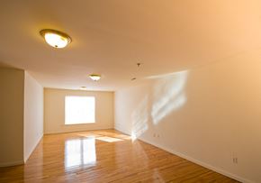 Orange apartment for rent - Living room with hardwood floors and large window