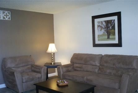 Las Vegas apartment for rent - a living room with a couch and a coffee table