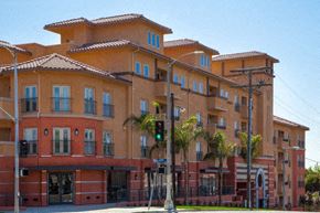 Los Angeles apartment for rent - A large apartment complex with red and beige buildings.