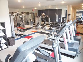 Cincinnati apartment for rent - a gym with a lot of equipment in it