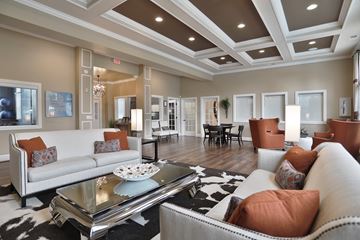 Fairborn apartment for rent - a living room with couches and chairs and a table