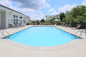 Fairborn apartment for rent - our resort style swimming pool is next to our building and has lounge chairs around it