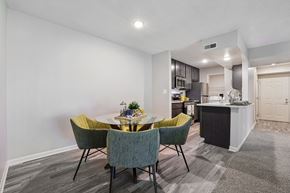 Southgate apartment for rent - A dining area with a table and chairs.