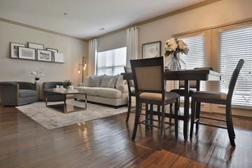 Mason townhouse for rent - a living room and dining room with a table and chairs