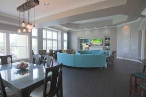 Centerville townhouse for rent - A modern dining room with a glass table and chairs.