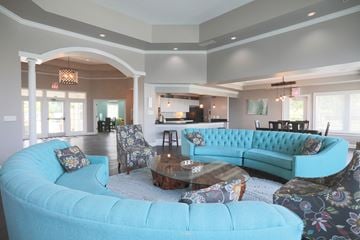 Centerville townhouse for rent - A living room with a blue couch and a coffee table.