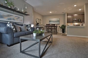 Loveland apartment for rent - a living room with a couch and a table