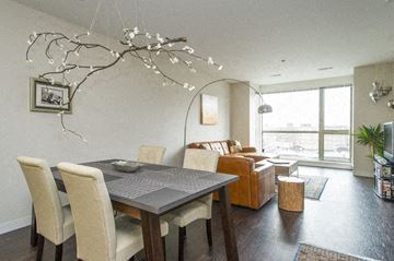 Allston apartment for rent - a dining room and living room with a table and chairs