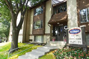 Essex apartment for rent - A building with a sign that says Hartland Model Apt. Leasing Center.