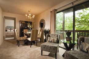 Essex apartment for rent - A living room with a couch, chairs, and a table.
