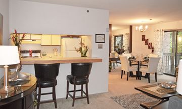 Catonsville apartment for rent - A dining room with a table set for two.