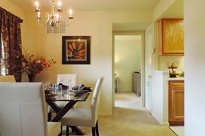 Parkville apartment for rent - A dining room with a table set for two.