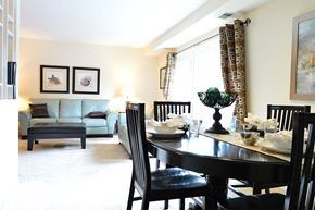 Parkville apartment for rent - Living room with couch and table at Tall Oaks Apartments, Parkville, 21234