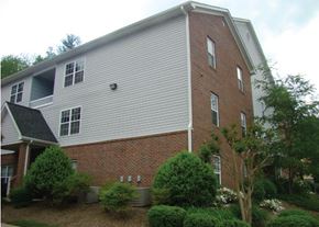 Cullowhee apartment for rent - the side of a house with a brick and white siding