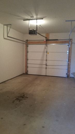 Nanticoke apartment for rent - A garage with a white door and a light on the ceiling.