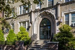 Jersey City apartment for rent - the front of a building with a door and stairs