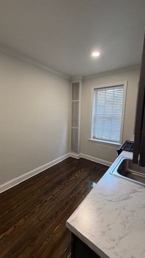 Jersey City apartment for rent - A kitchen with a sink and a window.