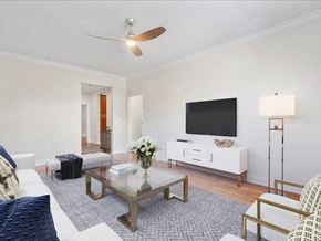 Summit apartment for rent - a living room with a couch and a tv