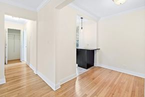 Upper Montclair apartment for rent - a renovated living room and dining room with white walls and wood floors